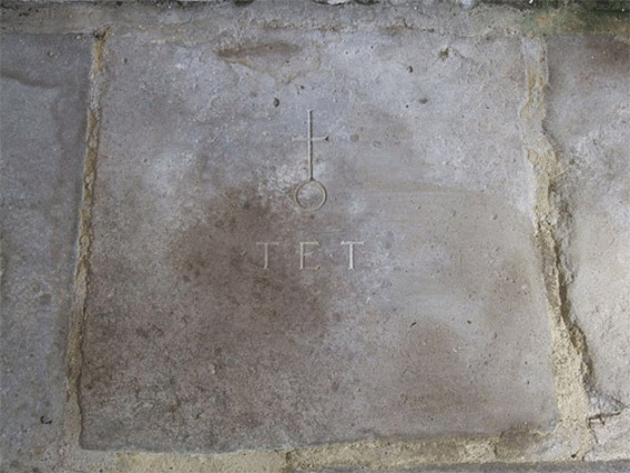 A stone marking the place of rest of the Rev T Tanner
